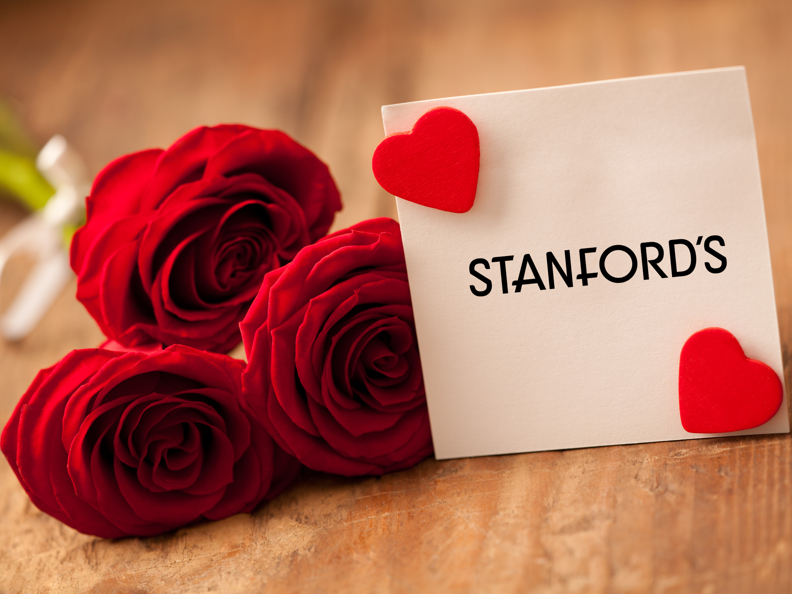 Stanford's Valentine's Day Logo Steakhouse Valentine's Day event roses and card labeled Stanfords